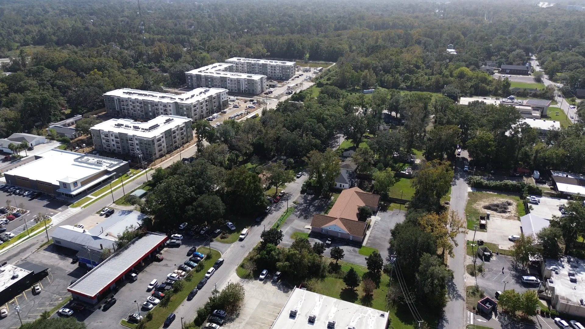 Aerial context showing adjacent retailers